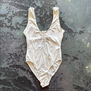 Cream Bodysuit One Piece with Plunging V-Neckline